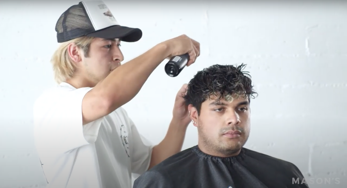 Styling with Mason's Pomade Sea Salt Spray to enhance curls